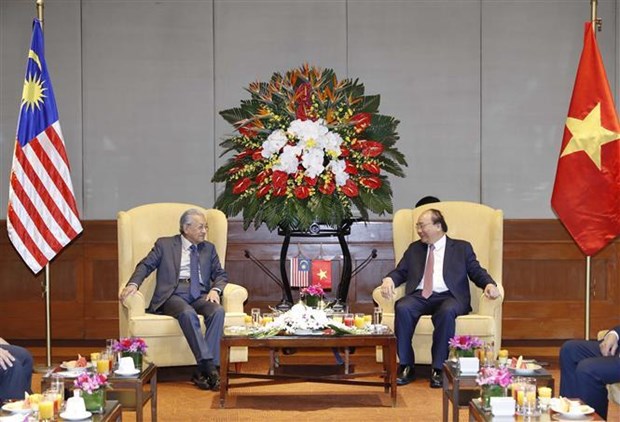 越南与马来西亚发表联合声明 强调进一步加强各领域的合作 hinh anh 1