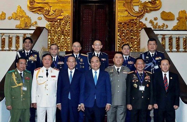 政府总理阮春福会见出席ASEANAPOL 39的各国代表团团长 hinh anh 1