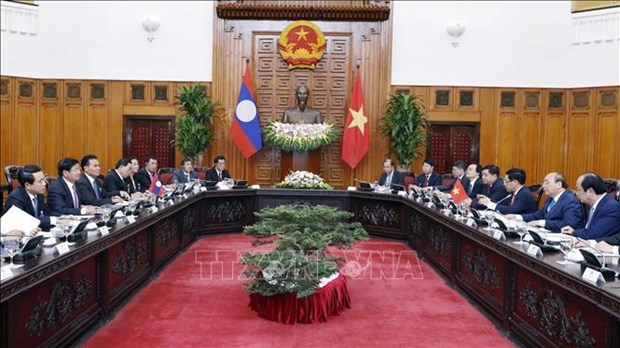越南政府总理阮春福与老挝总理通伦·西苏里举行会谈 hinh anh 2