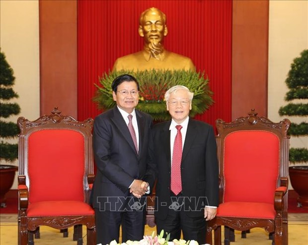 越共中央总书记、国家主席阮富仲会见老挝政府总理通伦·西苏里 hinh anh 1