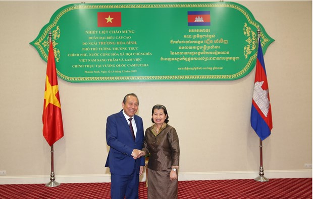 越南政府常务副总理张和平对柬埔寨进行访问 hinh anh 1