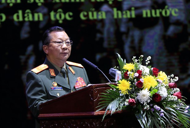 援老越南志愿军和专家传统日70周年纪念活动在万象隆重举行 hinh anh 1