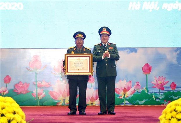 越南和老挝两国国家勋章授勋仪式在河内隆重举行 hinh anh 1
