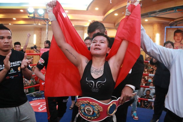 越南首名女拳手获得WBO亚太区腰带 hinh anh 1