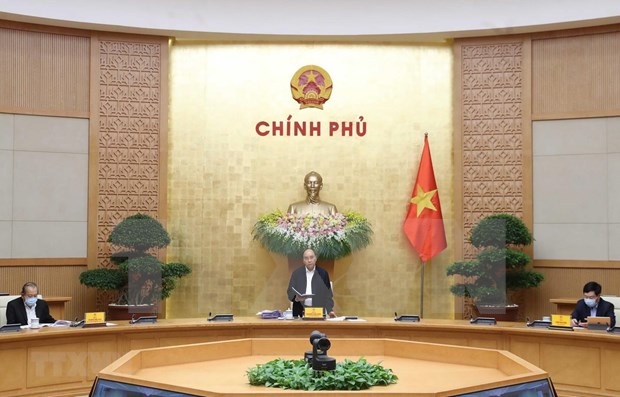 越南政府常务委员会举行会议讨论新冠肺炎疫情应对措施 hinh anh 1