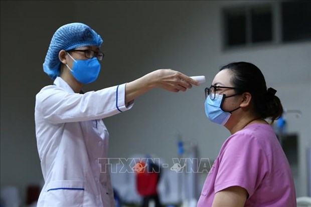美媒：越南人民响应和支持政府应对新冠肺炎疫情的方式 hinh anh 2