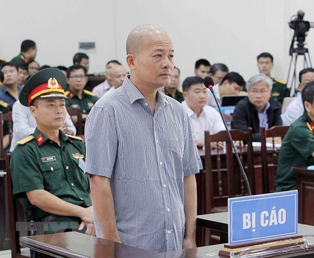 越南海军军种军事法院初审开庭 公开审理丁玉系和同案嫌犯 hinh anh 1