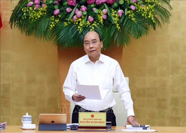 越南政府5月例行会议决议：努力实现防疫情促发展的“双重目标” hinh anh 1