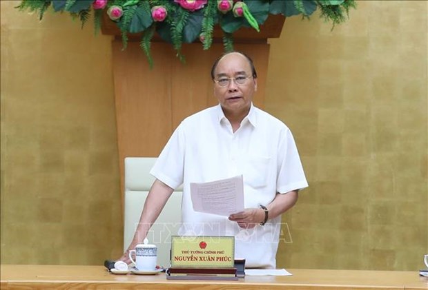 越南政府总理要求快速透明处理人员正当合理的出入境需求 hinh anh 1