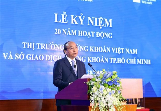 越南政府总理出席越南证券市场成立20周年纪念典礼 hinh anh 2