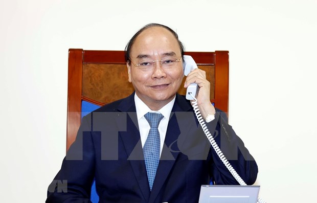 越南政府总理与欧盟委员会主席通电话 hinh anh 1