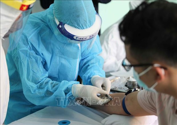 德国媒体：越南努力应对新冠肺炎疫情再次爆发 hinh anh 1