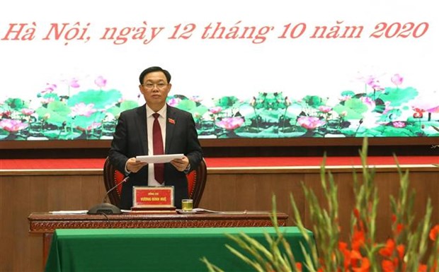 迎接党的十三大：王廷惠同志以100%赞成票再次当选河内市委书记 hinh anh 1