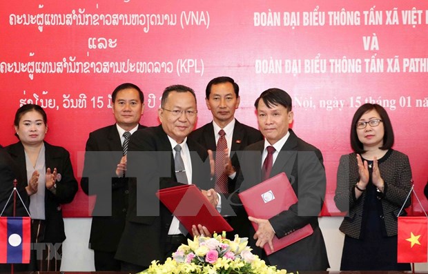 越通社与老挝国家通讯社合作在越老两国特殊友谊历史进程中成长 hinh anh 1