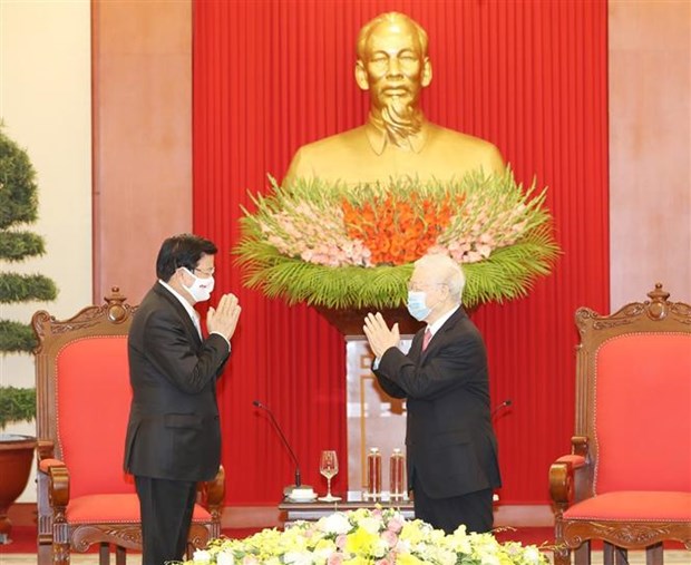 越共中央总书记、国家主席阮富仲会见老挝政府总理通论·西苏里 hinh anh 1