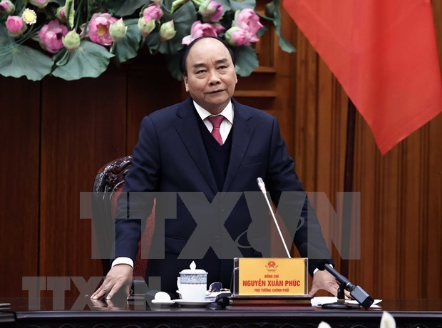 越南政府总理阮春福： 应采取强有力的措施和合适的方式推进国内新冠疫苗试验进程 hinh anh 1