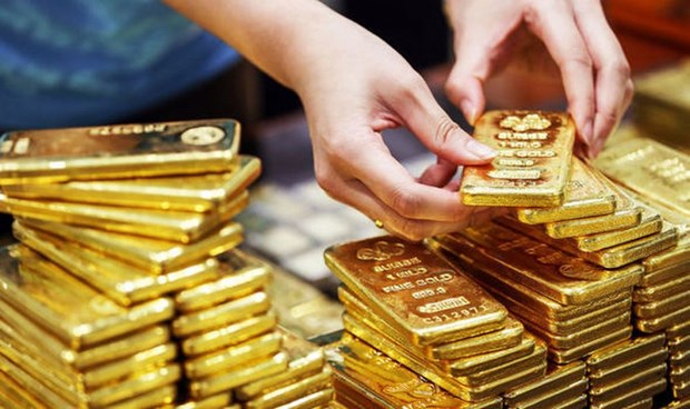 今日上午越南国内市场黄金价格每两超过5700万越盾 hinh anh 1