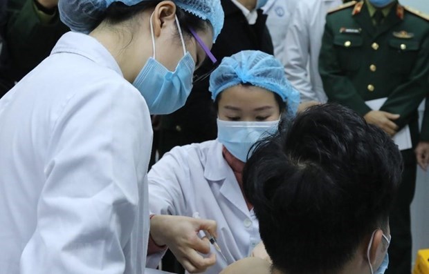 越南是新冠疫苗接受率最高的国家之一 hinh anh 1