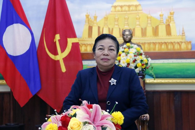 老挝人民革命党中央对外联络部部长：越南共产党领导越南取得举世瞩目的成就 hinh anh 1