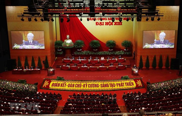 老挝媒体：越共十三大是新时期越南革命强劲发展的里程碑 hinh anh 1