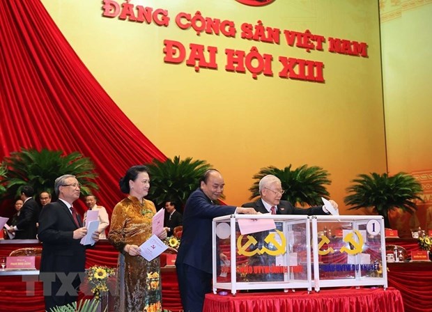 老挝人民革命党总书记、老挝总理通伦向越共中央总书记、国家主席阮富仲致贺电 hinh anh 1