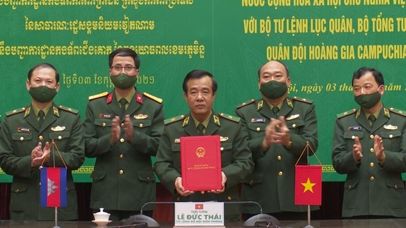 越南与柬埔寨共同签署边防合作备忘录 hinh anh 1