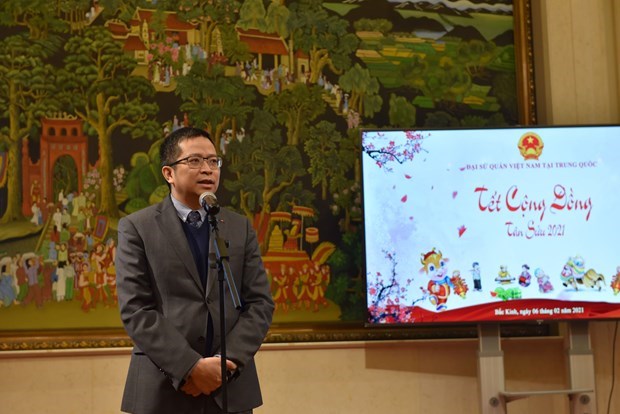 旅居中国越南人举行2021年迎新春活动 hinh anh 1