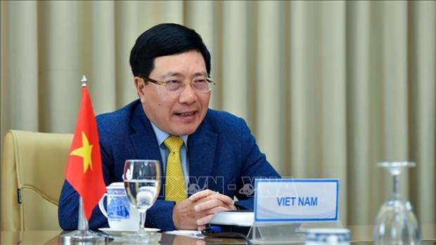 越南政府副总理兼外长范平明与委内瑞拉外长豪尔赫·阿雷亚萨举行视频会谈 hinh anh 1