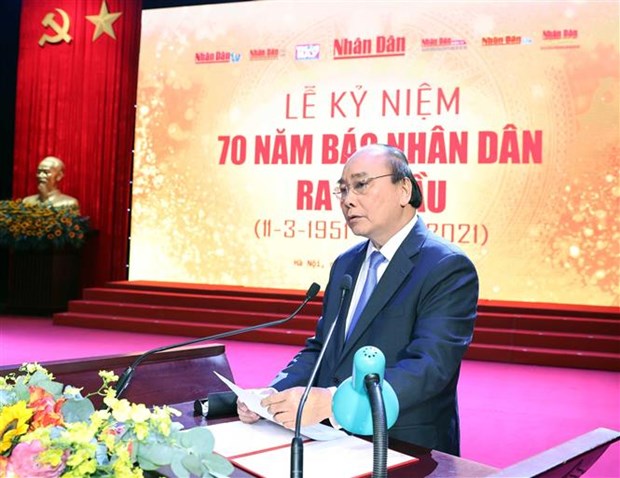 阮春福出席《人民报》创刊70周年纪念典礼 hinh anh 1