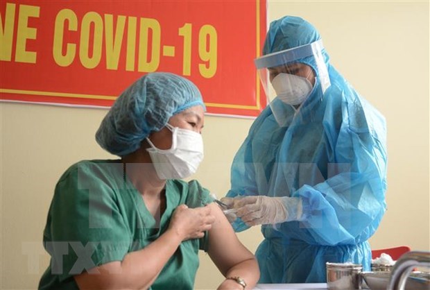 13日上午越南无新增新冠肺炎确诊病例 新冠疫苗接种人数5248人 hinh anh 1