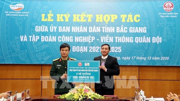 北江省与越南军队电信工业集团签署有关电子政务和智慧城市建设合作备忘录 hinh anh 2