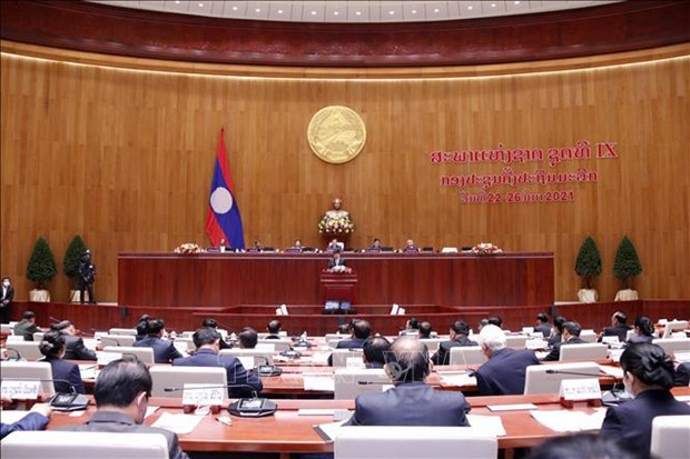 越南党和国家领导人向老挝国家、政府和国会致贺电 hinh anh 1