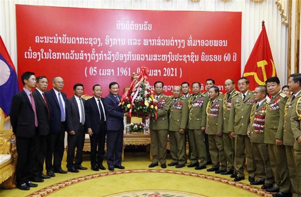 越南与老挝公安并肩携手共谋发展 hinh anh 1