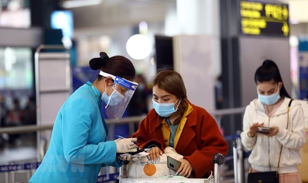 越南各家航空公司拒绝未进行健康申报的乘客登机 hinh anh 1