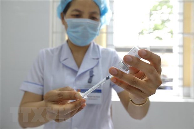 越南政府总理颁发关于加强新冠肺炎疫情防控工作的通知 hinh anh 1