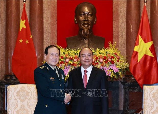 越南国家主席阮春福会见中国国防部部长魏凤和 hinh anh 2
