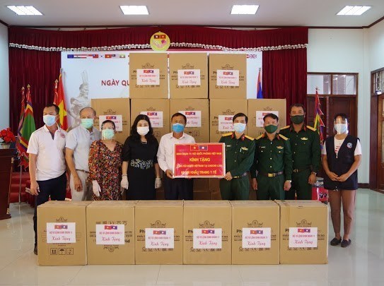 新冠肺炎疫情：旅居老挝越南人与老挝政府携手抗疫 hinh anh 1