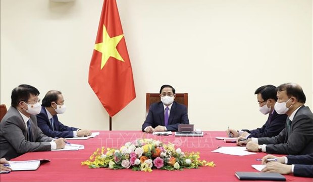 越南政府总理范明政与加拿大总理特鲁多通电话 hinh anh 1