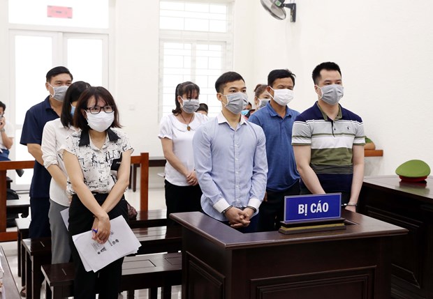 河内市人民法院开庭审理组织人员偷渡韩国案 hinh anh 1