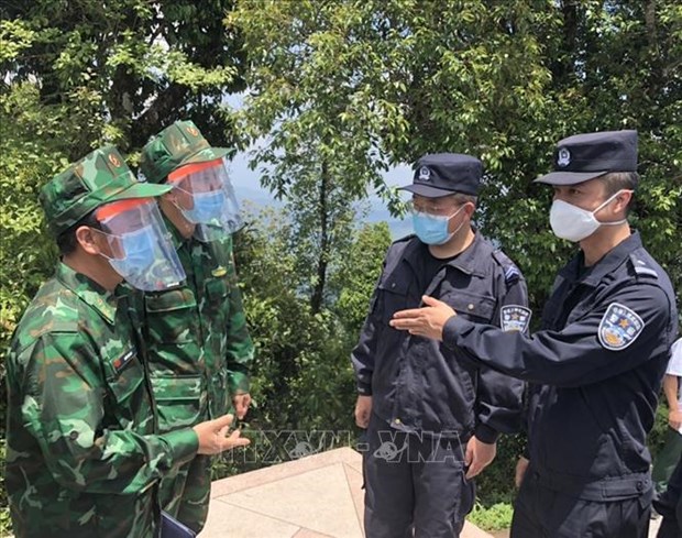 越南-中国-老挝维护边界力量举行交流会 hinh anh 2