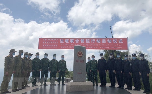 越南-中国-老挝维护边界力量举行交流会 hinh anh 3