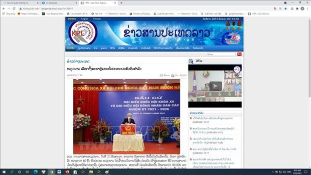 国会和人民议会换届选举：老挝媒体纷纷报道越南成功举行换届选举 hinh anh 1
