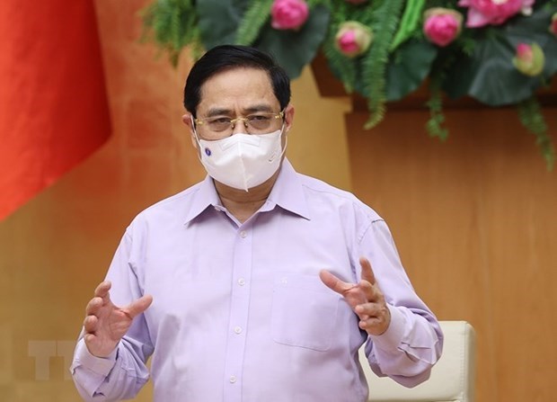 范明政总理：坚决抗击疫情 保护好人民群众的身体健康和生命安全 hinh anh 1