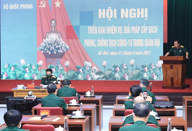 新冠肺炎疫情防控中“提前一步和更先一步”是越南军队强调的主张 hinh anh 2