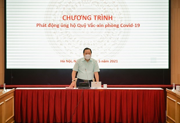 越南各家集团、总公司向新冠疫苗基金捐款2.3万亿越盾 hinh anh 1