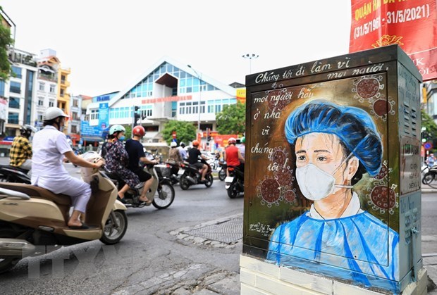 老挝总理潘坎•维帕万就越南疫情复杂严峻向政府总理范明政致慰问信 hinh anh 1