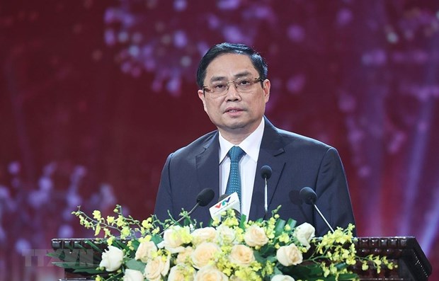越南政府总理范明政：新冠疫苗基金会是团结基金 hinh anh 1