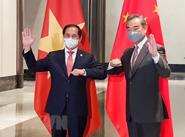 越南与中国两国外长举行会谈 hinh anh 1