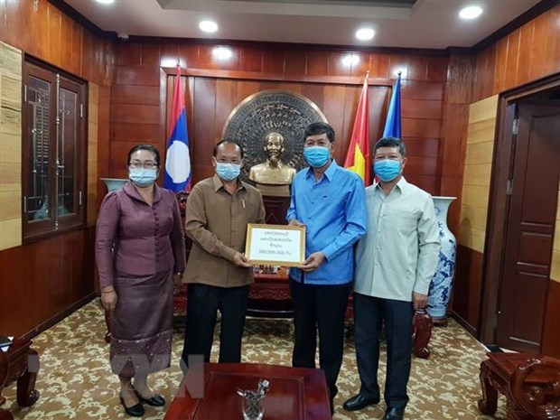 老挝与越南携手抗击新冠肺炎疫情 hinh anh 2