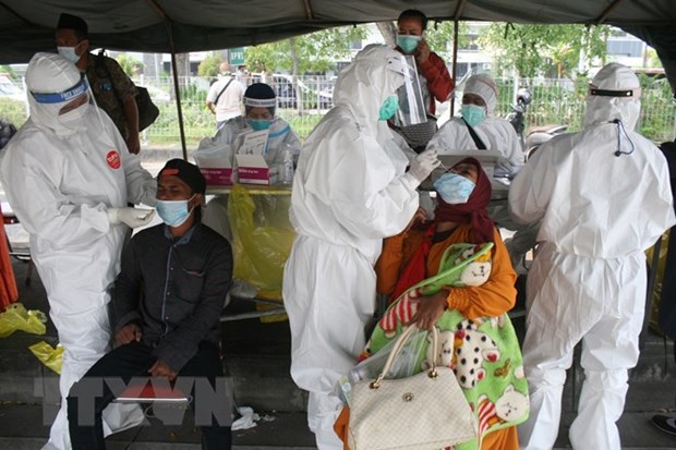 东南亚新冠肺炎疫情：印尼单日病例创2月以来新高 马来西亚新增73例死亡病例 hinh anh 1